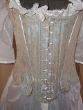 Detail of stays showing thread eyelets. Some stays lace in the front and the back - this allows them to be put on and taken off easily.